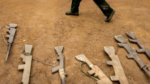 Wooden drill rifles at a camp in Myanmar in 2022.