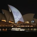 A Hanukkah menorah is projected onto the sails of the Sydney Opera House in memory of the victims of the shooting at Bondi Beach in Sydney on December 15, 2025.