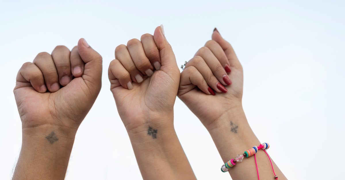 Coptic Christians in Egypt tattoo crosses on their right wrists as a symbol of their faith.