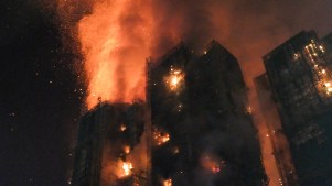A major fire engulfs several apartment blocks in Hong Kong's Tai Po district on November 26, 2025.