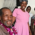 Wafula celebrating his 91st birthday with his daughter and grandchildren in December 2024.