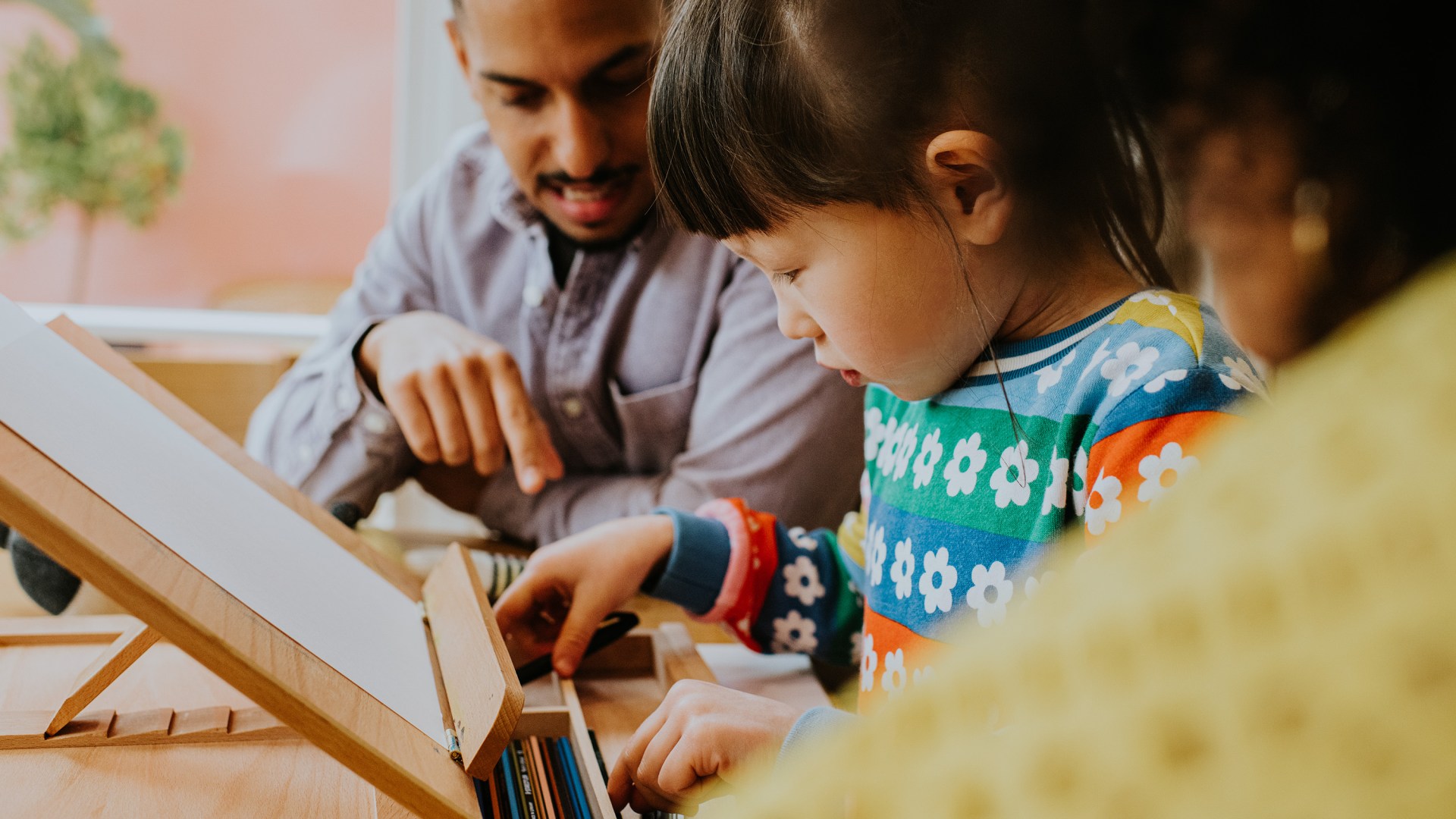A family helping a foster child.