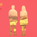 The silhouette of a man and a woman with a landscape in the background.