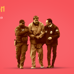 Two DEA agents walk on either side of a handcuffed Venezuelan President Nicolás Maduro.