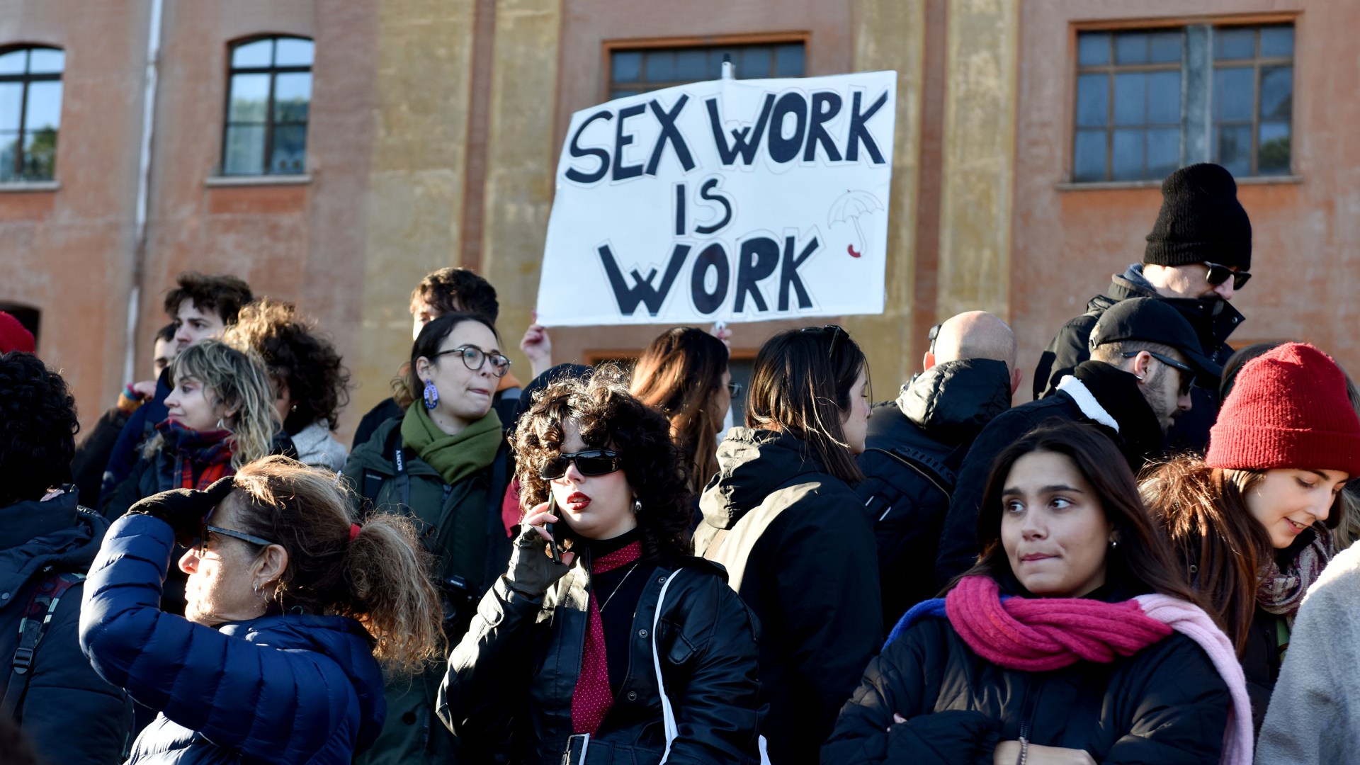 People participating in the National demonstration against patriarchal violence against women in Rome, Italy.