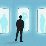 A person standing in front of several giant phones.