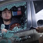 U.S. Border Patrol agents smash a man's car window before dragging him out and taking him into custody when he failed to present citizenship documentation at a gas station on January 11, 2026 in St. Paul, Minnesota.