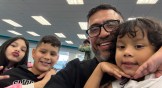 Pastor Elias Rodriguez with three children he flew to Venezuela to reunite with their mother after she was deported without them.