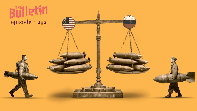 A large balance scale, one side with a US flag and the other with a Russian flag, with missiles on both sides.