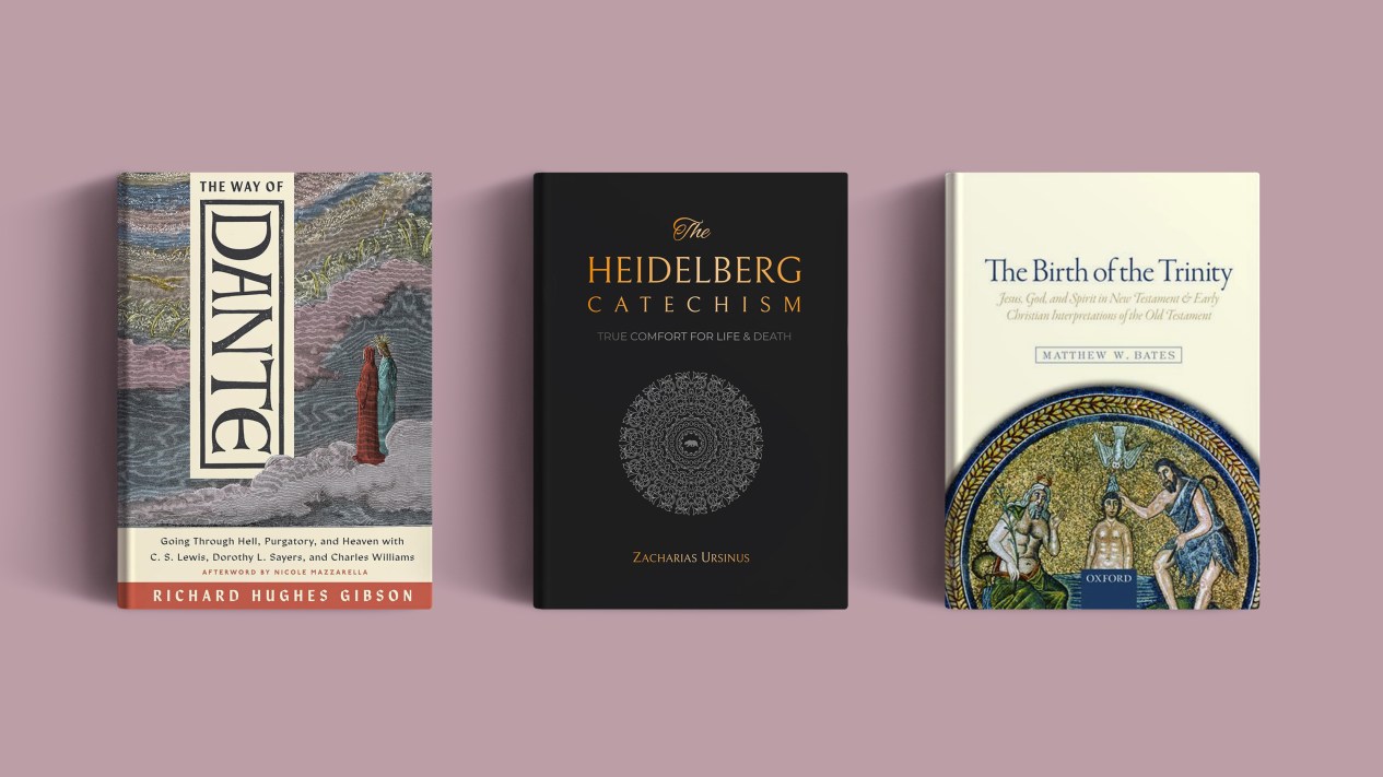 Three books on a pink background.