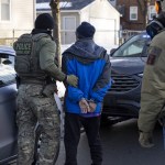 Federal Agents arrest a man after scanning his face as they stopped and questioned him in the street during an Immigration Enforcement Operation in Minneapolis, Minneapolis, MN, U.S., January 13, 2026.