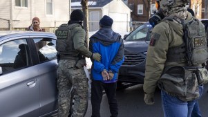 Federal Agents arrest a man after scanning his face as they stopped and questioned him in the street during an Immigration Enforcement Operation in Minneapolis, Minneapolis, MN, U.S., January 13, 2026.