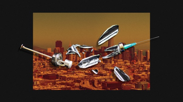 A broken syringe on top of a photo of San Francisco.