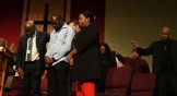 Faith leaders pray at St. John Missionary Baptist Church in Springfield, Ohio.