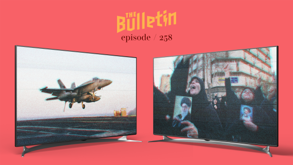 Two televisions, one depicting a fighter jet taking off, the other depicting protesters holding photos of Ayatollah Ali Khamenei.