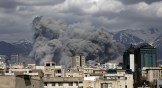 Smoke rises in Tehran after Israeli airstrikes hit Iranian capital.