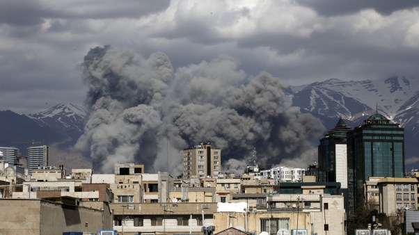 Smoke rises in Tehran after Israeli airstrikes hit Iranian capital.