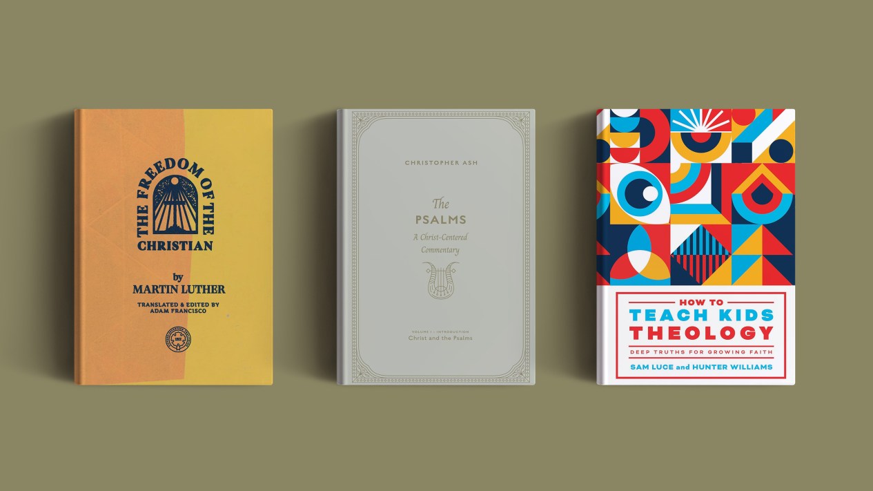 Three books on a brown background.