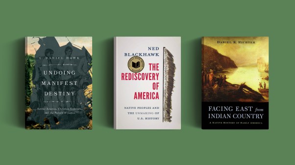 Three books on a green background.