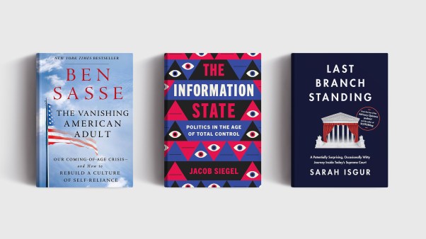 Three books on a gray background.