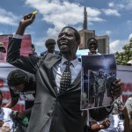 Families of Kenyans recruited illegally to fight for the Russian army in the Russia-Ukraine war hold photos of their missing relatives during a protest demanding answers in Nairobi, Kenya, on March 05, 2026.