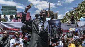 Families of Kenyans recruited illegally to fight for the Russian army in the Russia-Ukraine war hold photos of their missing relatives during a protest demanding answers in Nairobi, Kenya, on March 05, 2026.