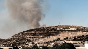 Smoke from an explosion due to Israeli bombardment rises in the hills of Rmeich in southern Lebanon.