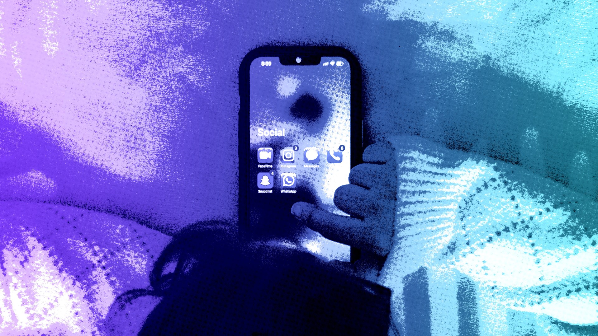 A young child on a phone.