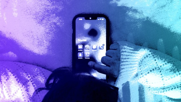 A young child on a phone.