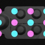A packet of abortion pills with pink and blue circles around it.