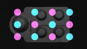 A packet of abortion pills with pink and blue circles around it.