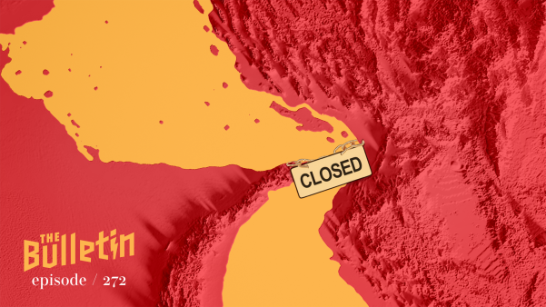 Arial view of the Strait of Hormuz with a "closed" sign on it.