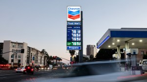 High gas prices are displayed at a downtown Chevron station on March 3, 2026 in Los Angeles, California.