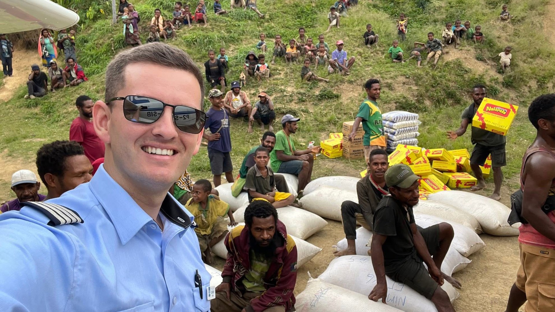 Johnny Reeves, a JAARS Pilot in Papua New Guinea, bringing in supplies.