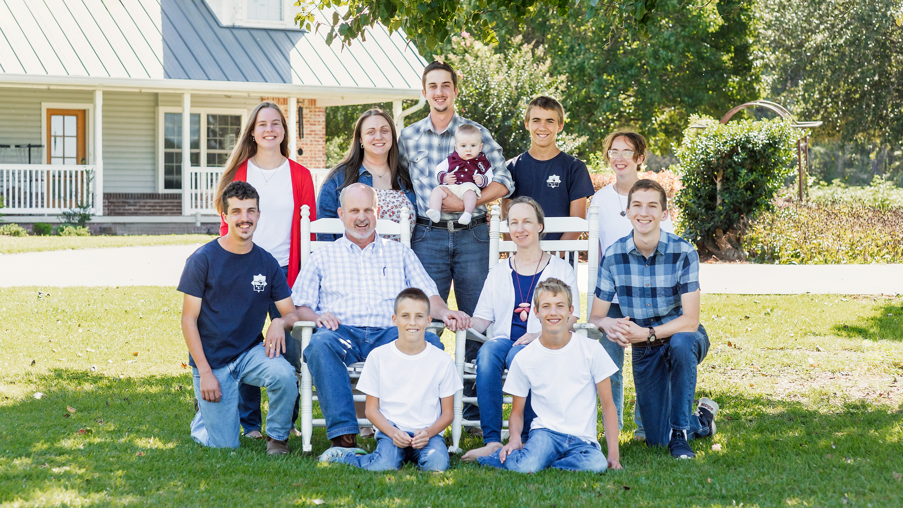 Rodney Mast with his family, including his daughter-in-law, grandson, and adopted Ukrainian sons, taken by one of the Ukrainian refugees.