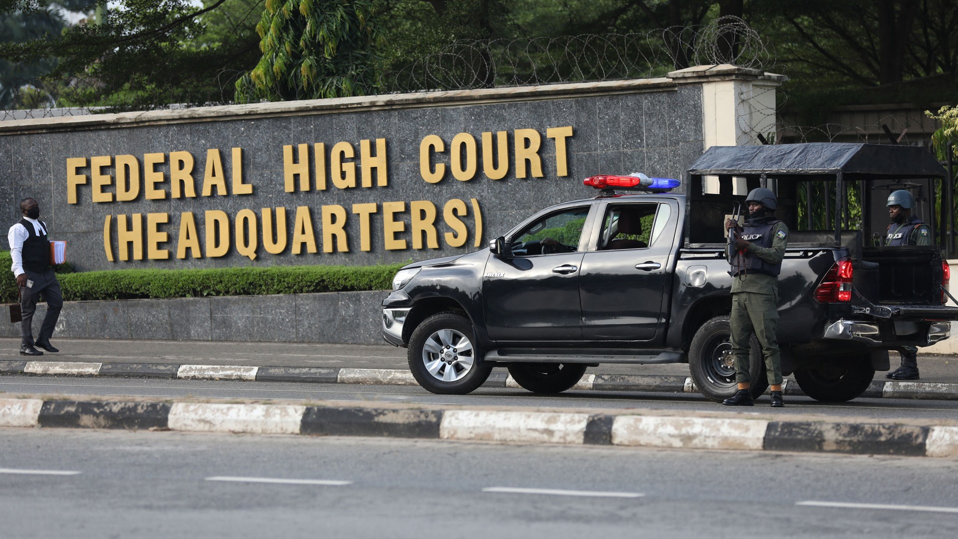Members of the Nigeria police force are seen outside the Federal High Court.