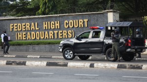 Members of the Nigeria police force are seen outside the Federal High Court.