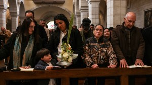 Christians attend Palm Sunday mass at the Catholic Church of Saint Catherine in the occupied West Bank city of Bethlehem on March 29, 2026.
