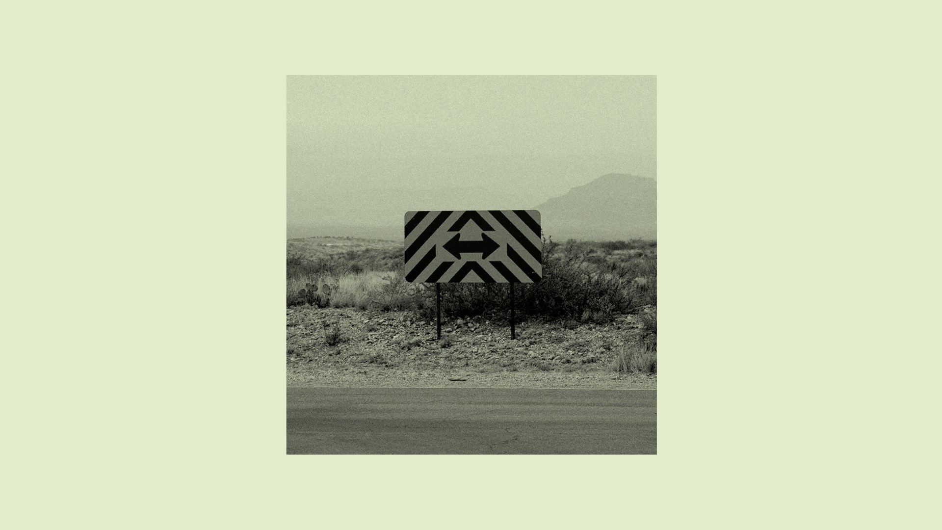 A road sign pointing in two directions.