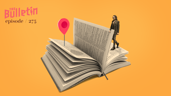 Russell Brand walking through the page of a Bible.