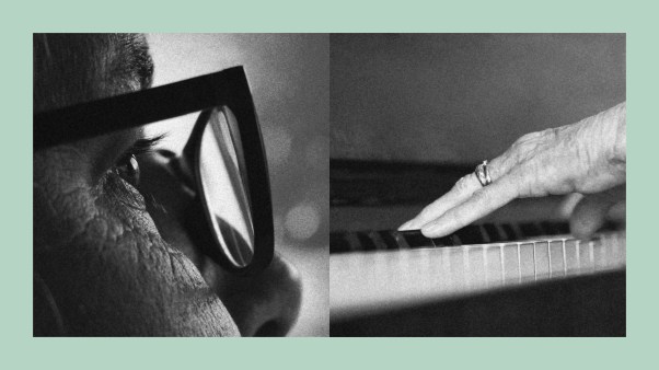 An image of an elderly lady playing the piano.