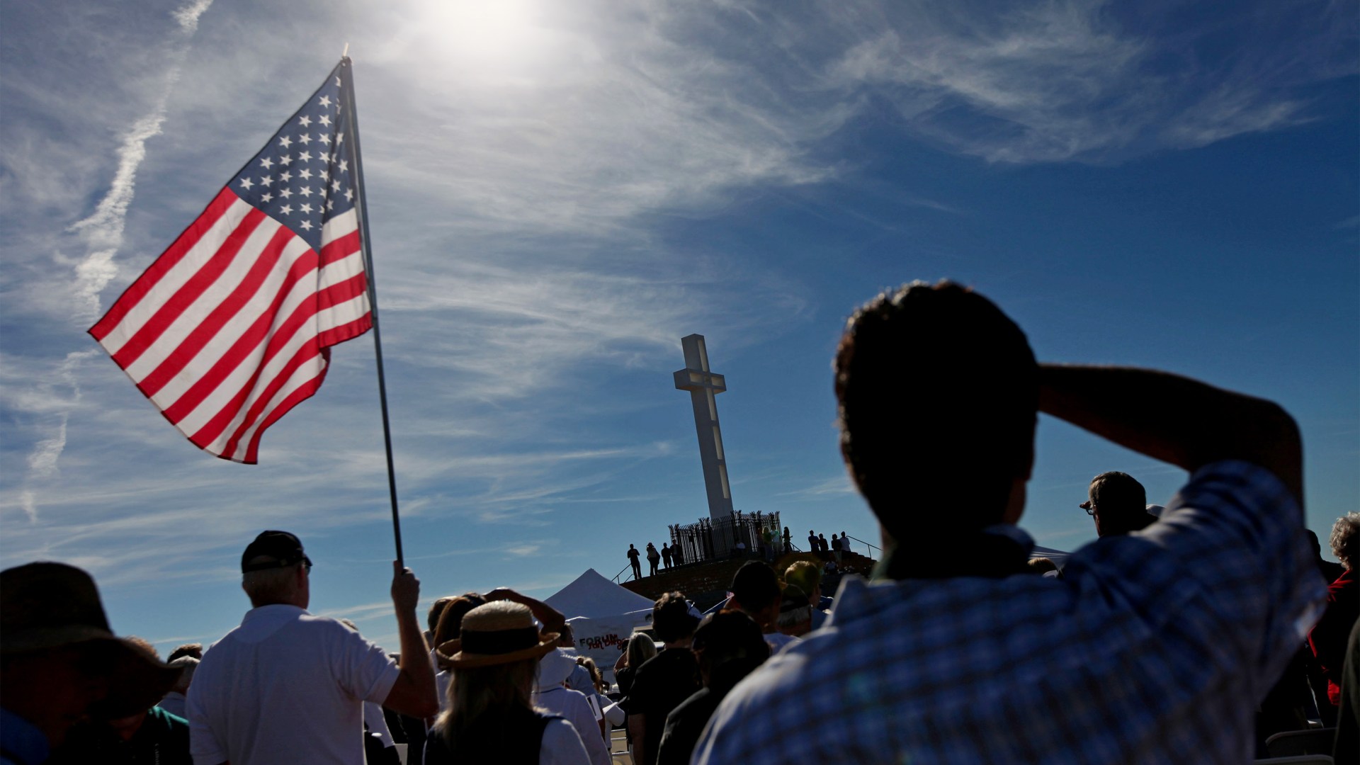 Supporters praying during a rally to keep the Mt. Soledad Cross on Saturday, January 15, 2011 in San Diego, California.