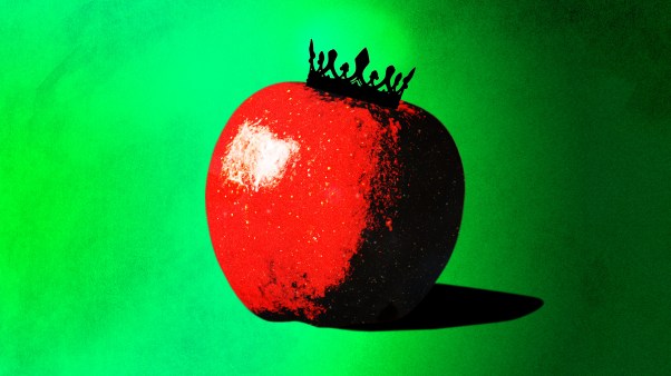 An apple, representing original sin, with a black crown on it.