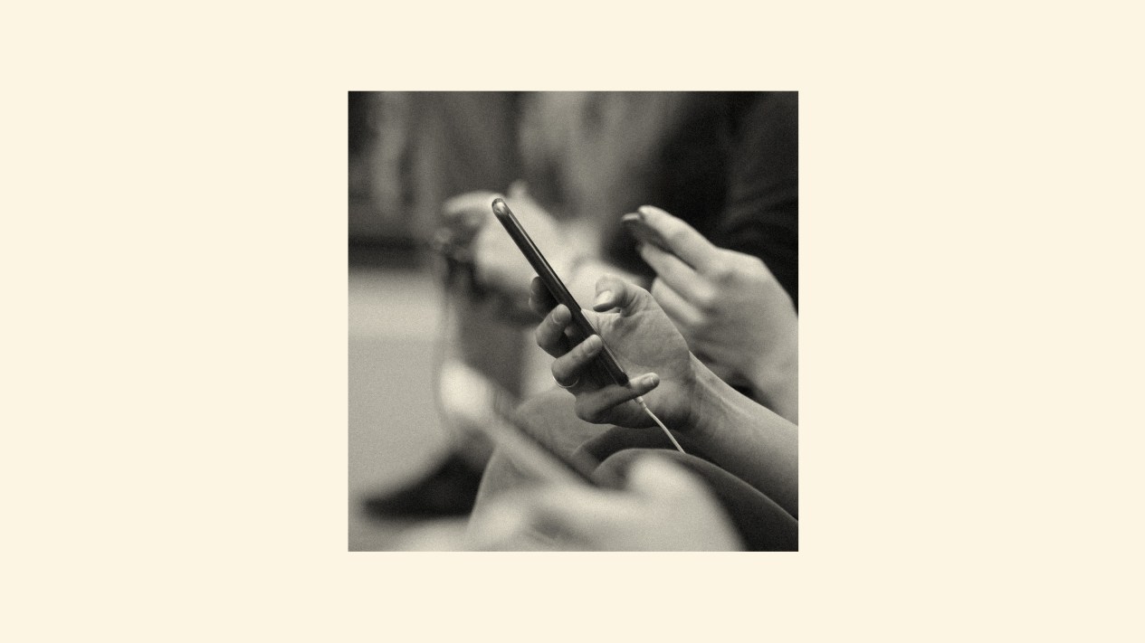 An image of people scrolling on their phones.