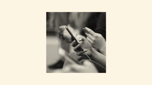 An image of people scrolling on their phones.