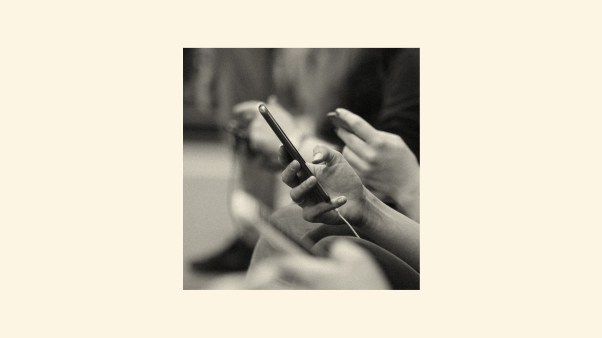 An image of people scrolling on their phones.